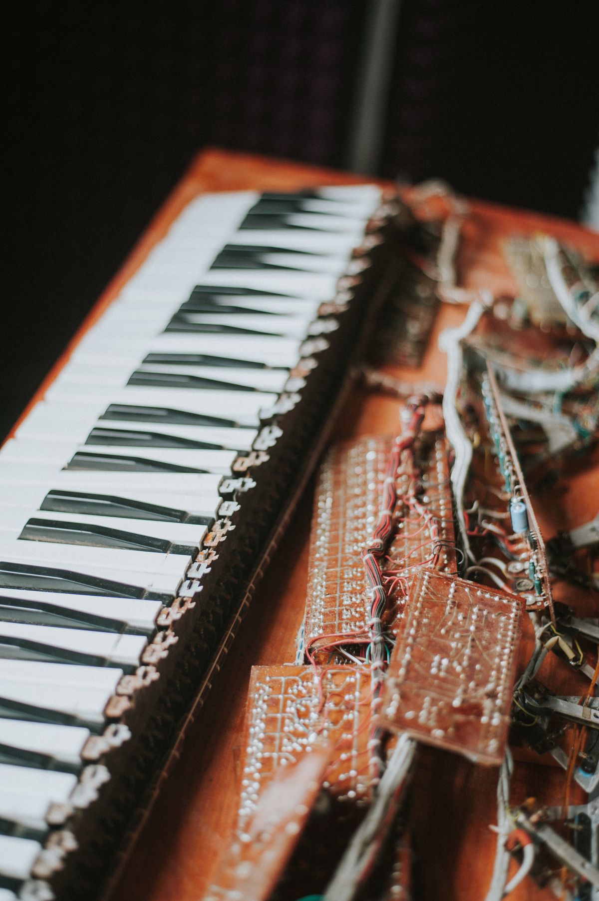 The inner workings of a piano opened for repair
